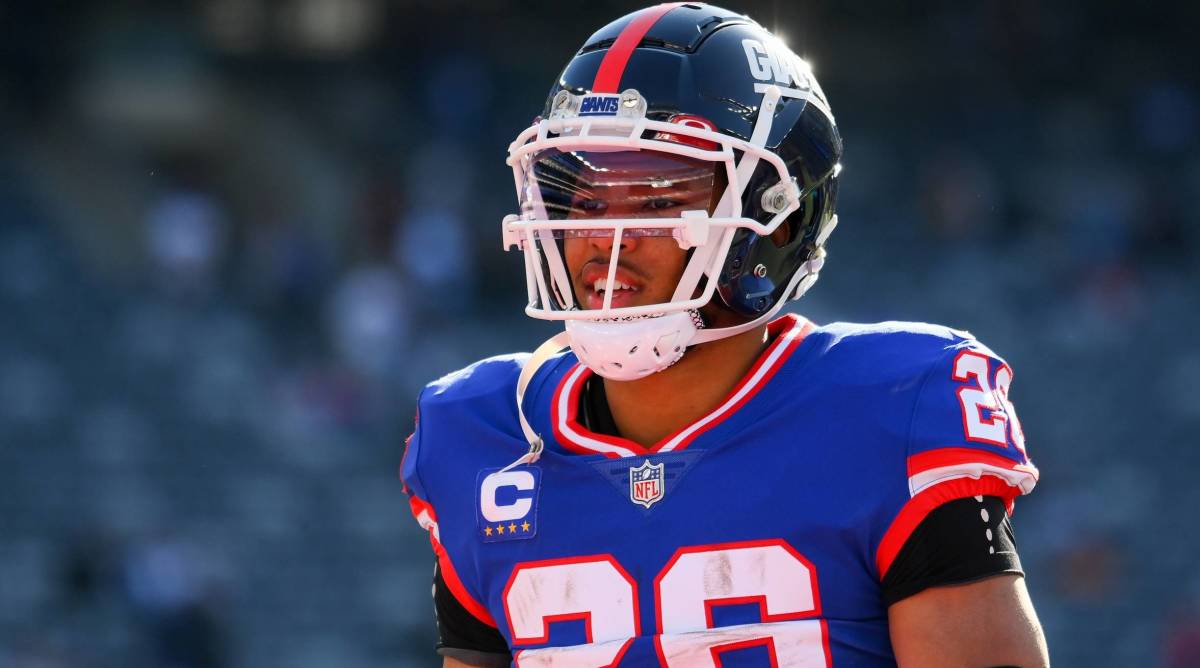 Giants running back Saquon Barkley looks on during a game.